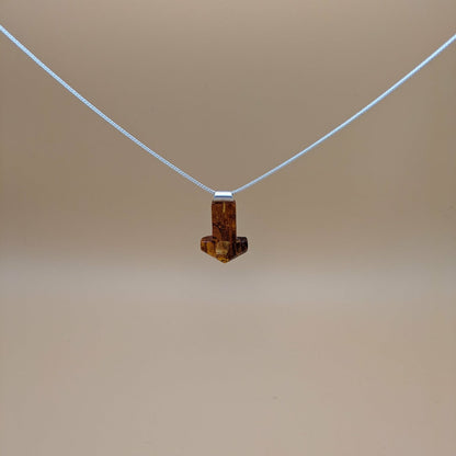 Handcarved Mjølner amber pendant with silver tube
