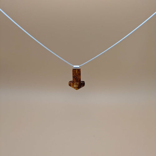 Handcarved Mjølner amber pendant with silver tube