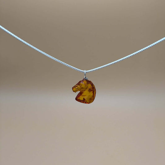Amber horse pendant