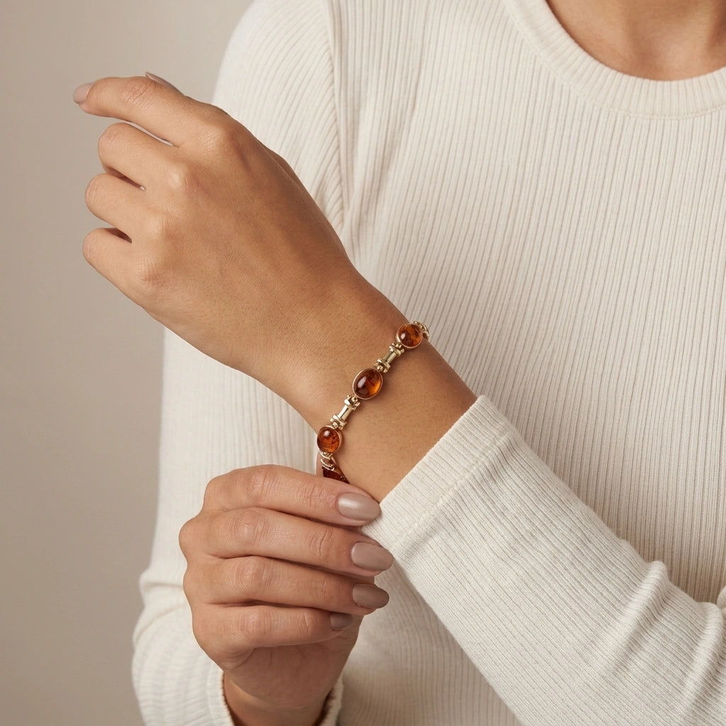 Gold and amber - Bracelet with oval amber beads and 14 t solid gold links