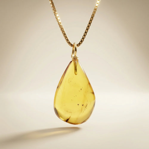 Pendant with 3 inclusion & 14 kt gold