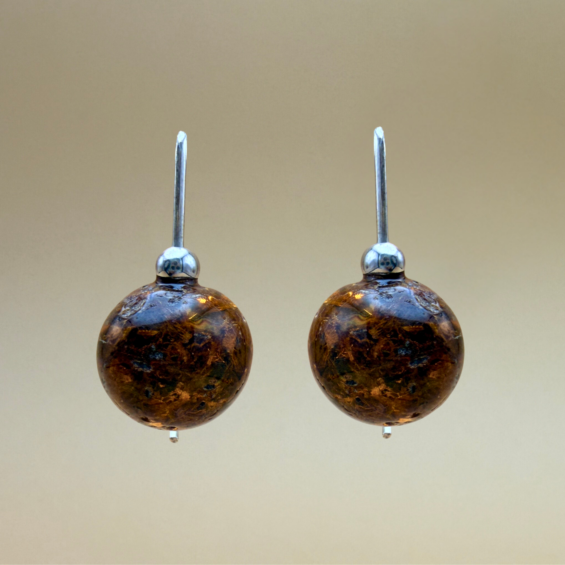 Moss green amber arrigns with silver hoop