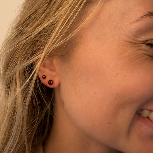 Dark cognac amber earstick