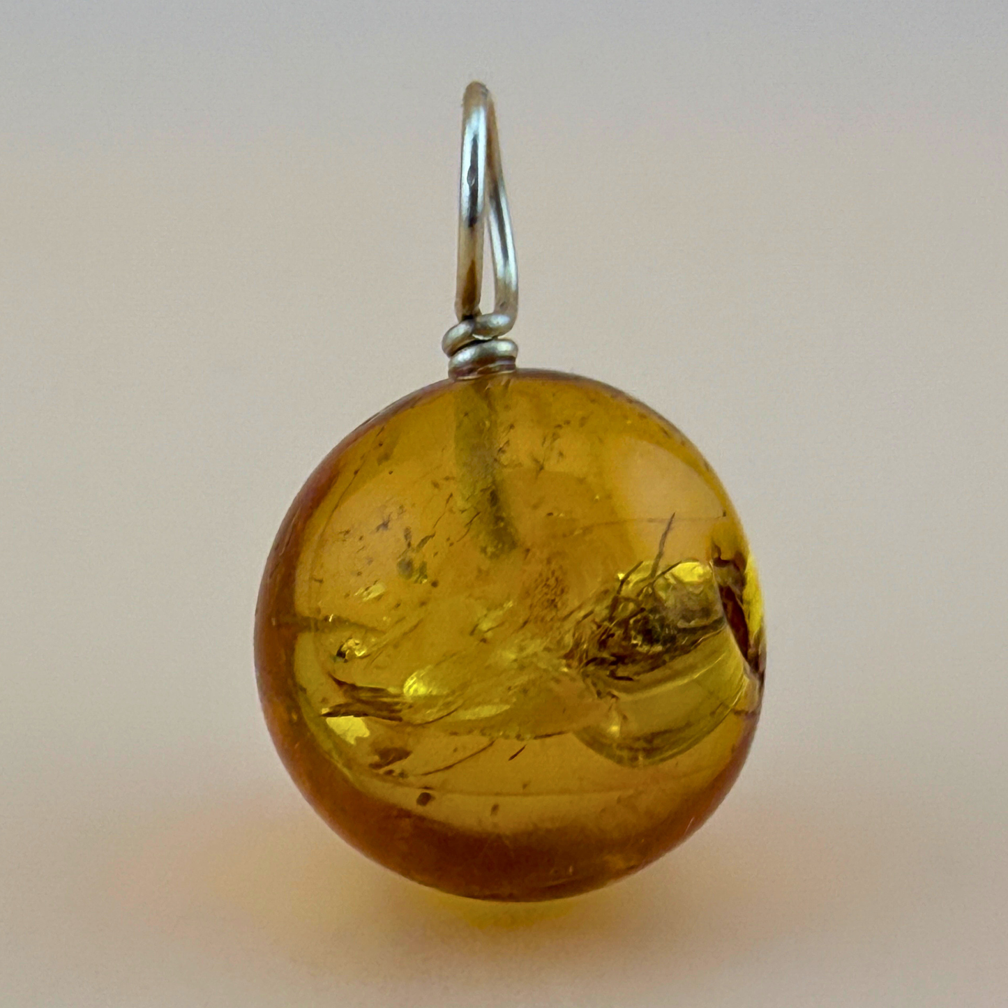 Pendant with spider inclusion & 14 kt gold