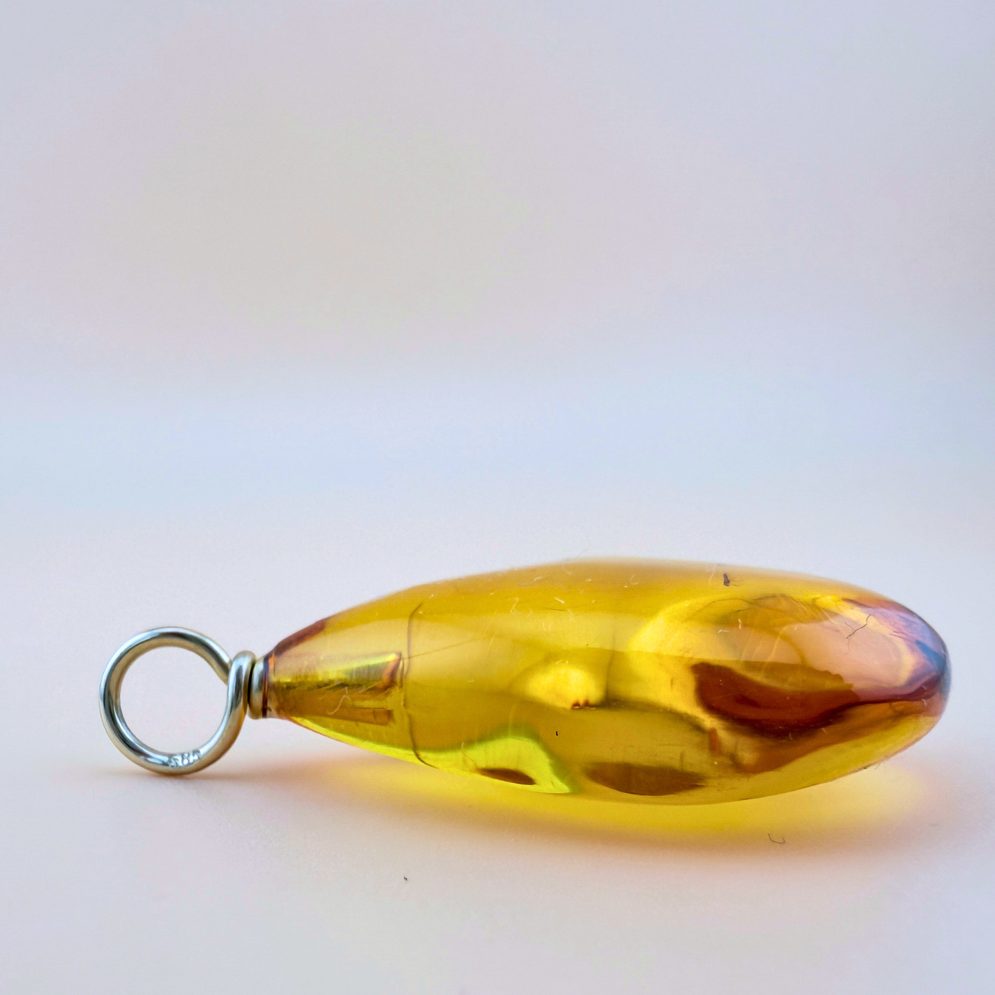 Pendant with 3 inclusion & 14 kt gold