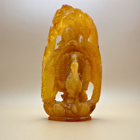 Krishna - Amber Figure with Peacock