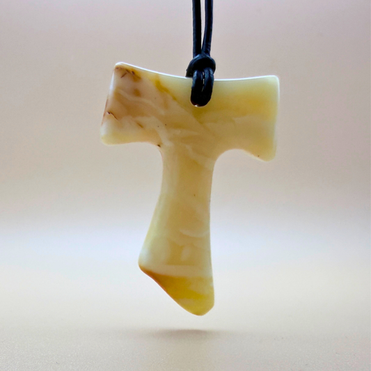 Tau cross with black leather cord