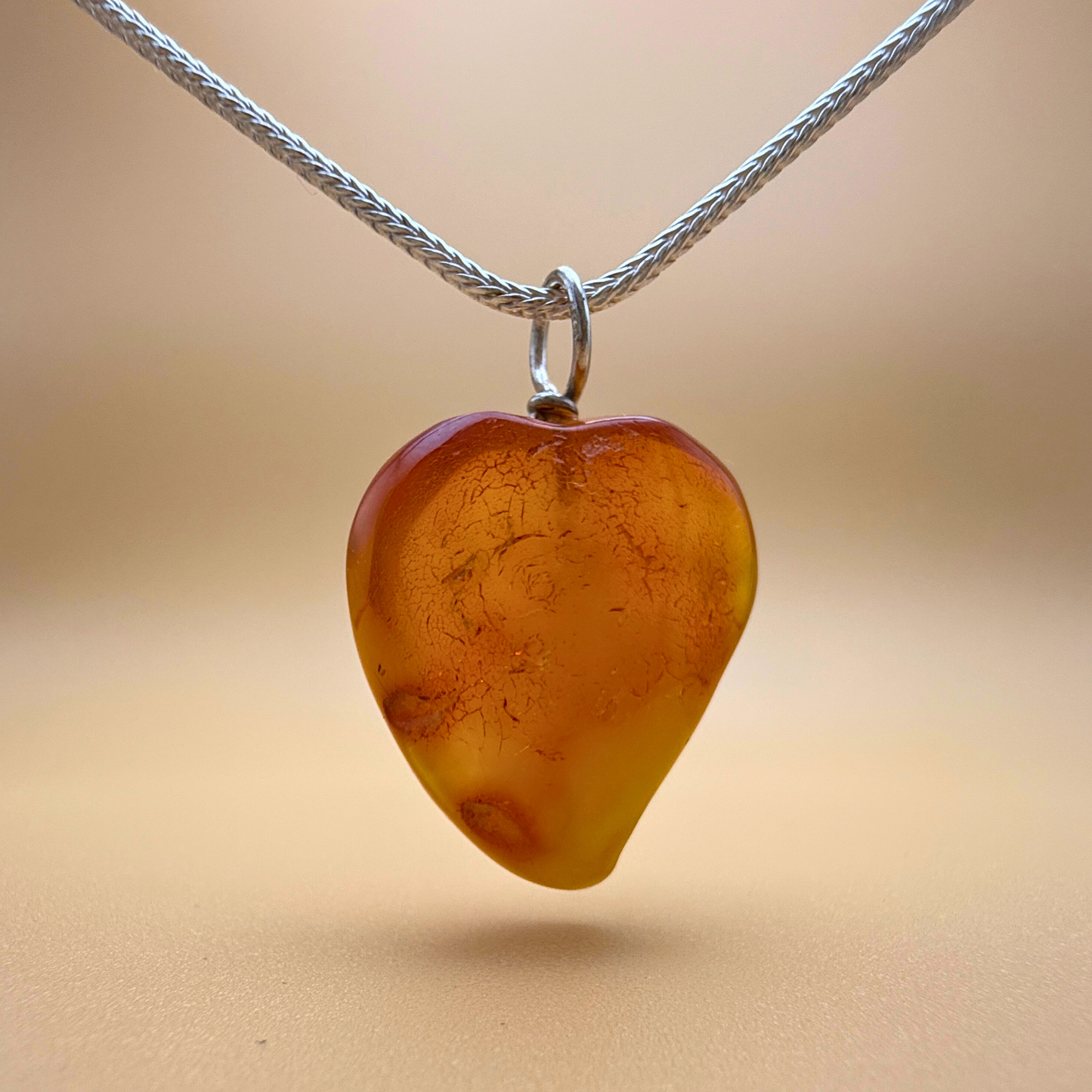 Amber heart pendant Milky sky backside