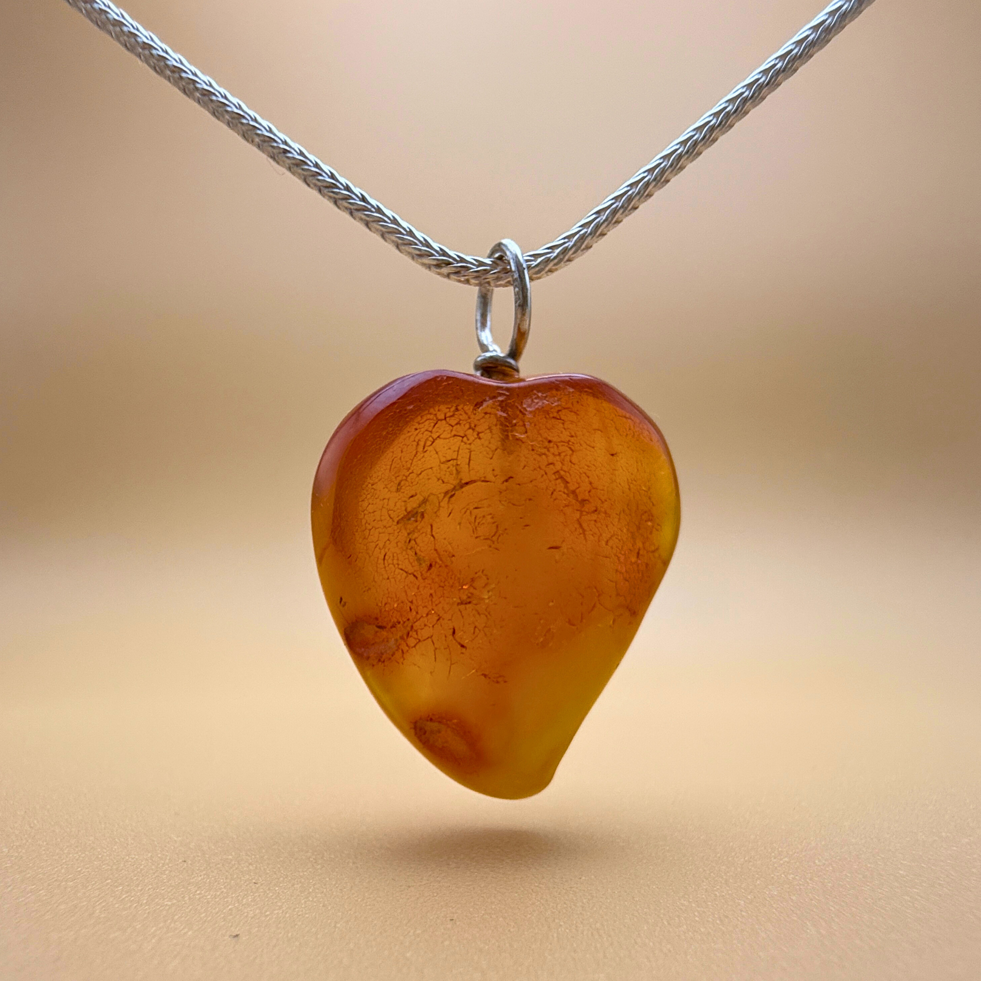 Amber heart pendant Milky sky backside